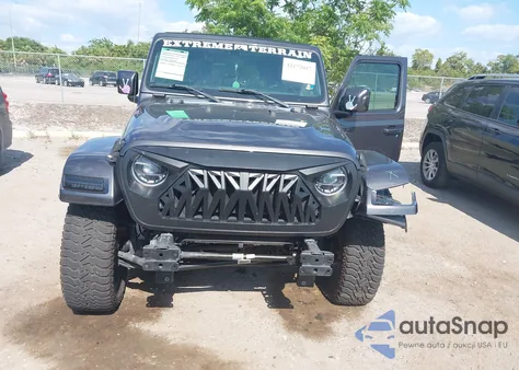 2020 Jeep Wrangler Unlimited Sahara from USA, damaged, VIN 1C4HJXEN2LW325103